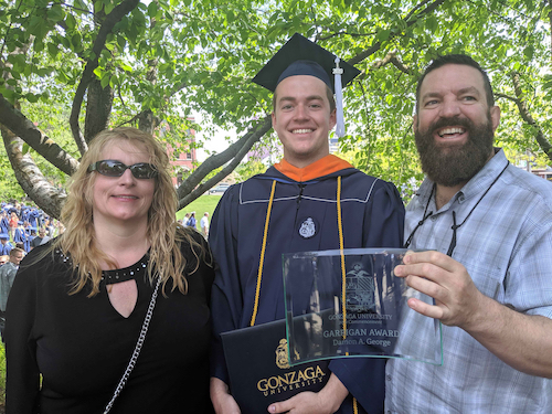 My parents and I after graduation